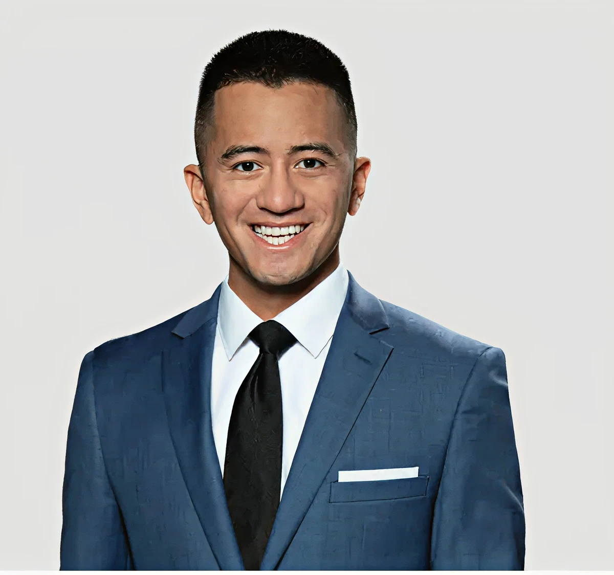 Smiling man in blue suit