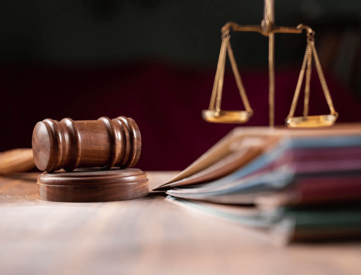 Judge's gavel with balance scales